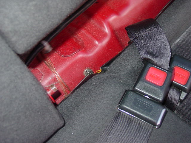 In Civic and Integras, there is a small 10mm bolt that needs to be removed. Once you get that out of the way, wiggle the seat until it is out of the way.