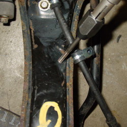 If you plan to add an extra clamp, find a flat spot on the sub frame, drill and tap.