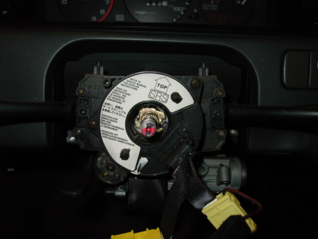 Remove the steering column cover by pulling out three screws located on the bottom.